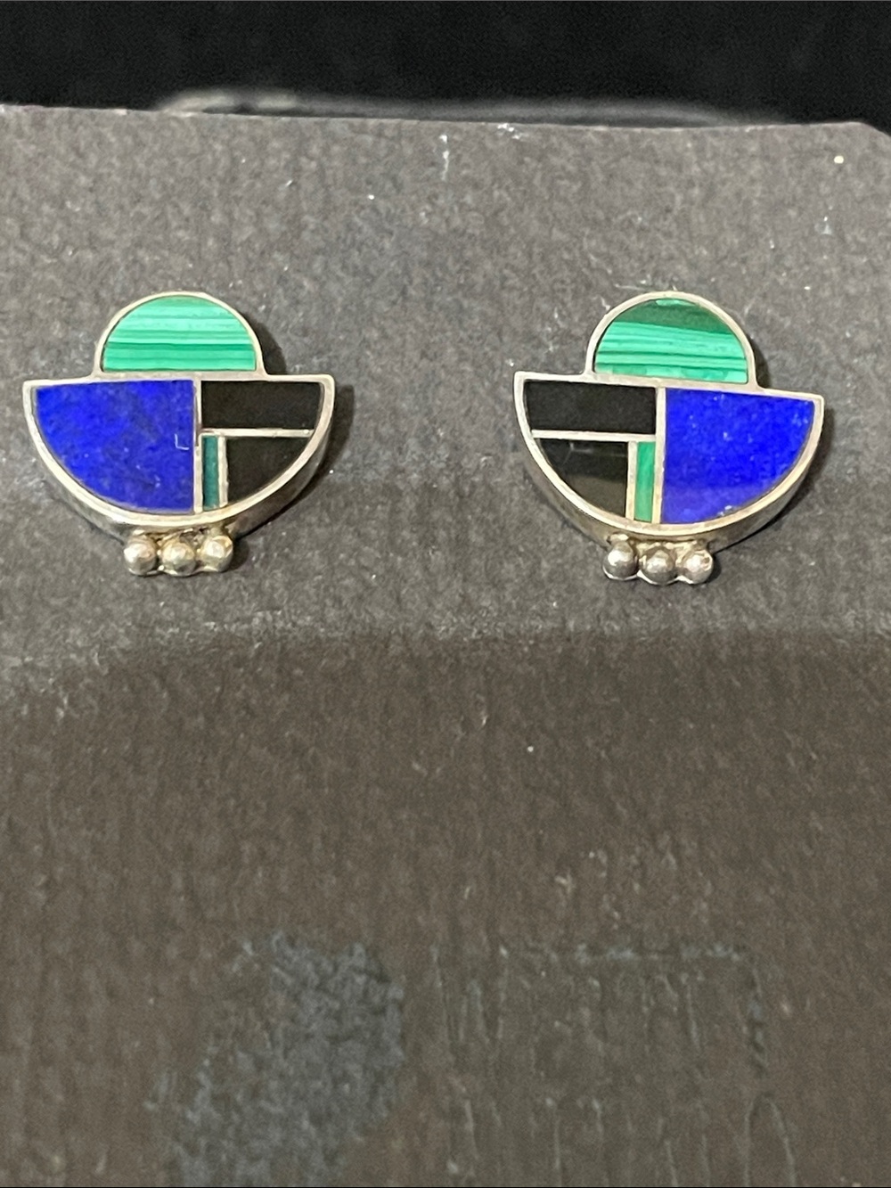 Native American sterling silver and natural stone earring.